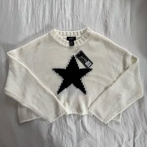 White and black sweater